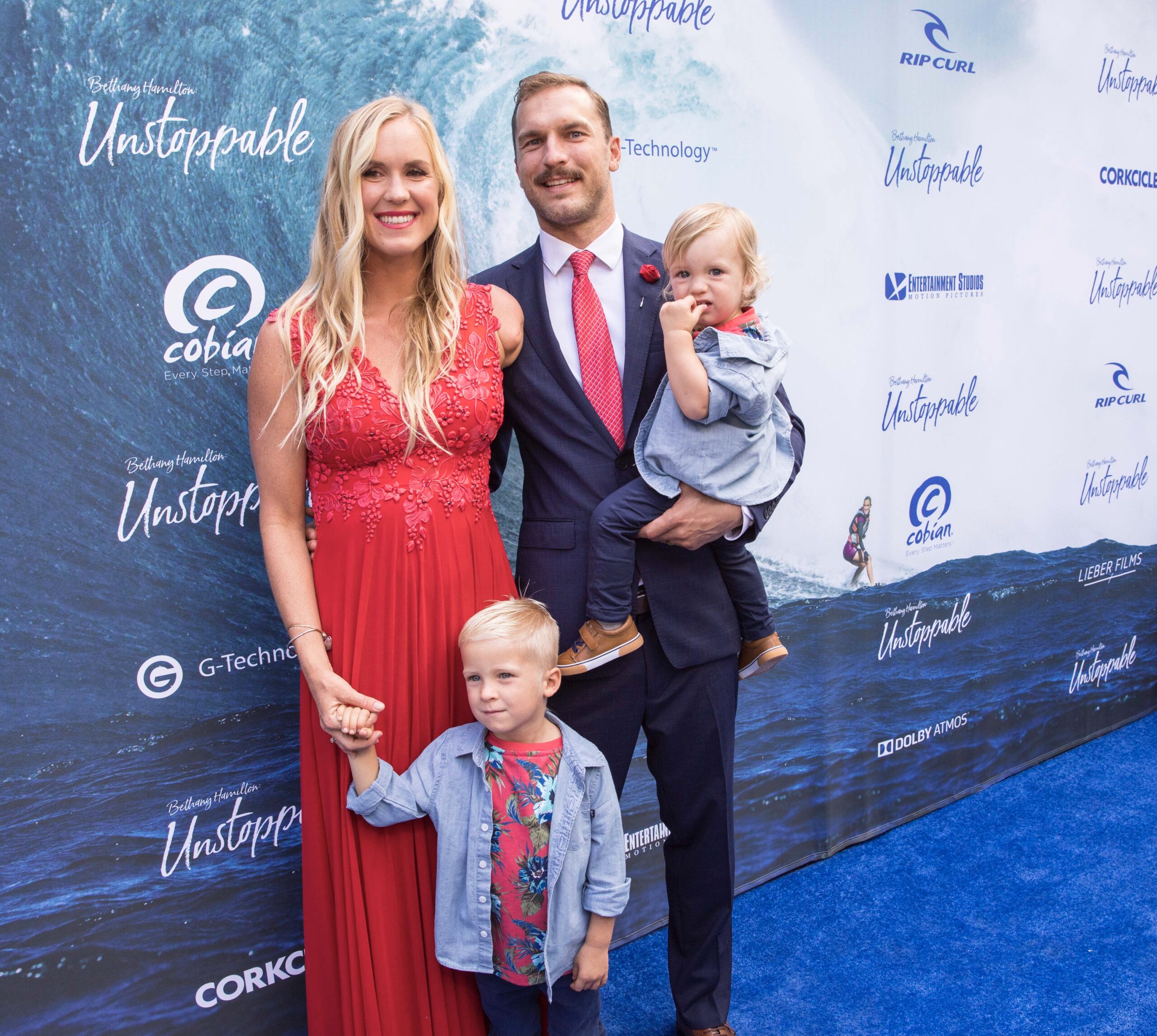 Bethany & her family smile at the Unstoppable Premier