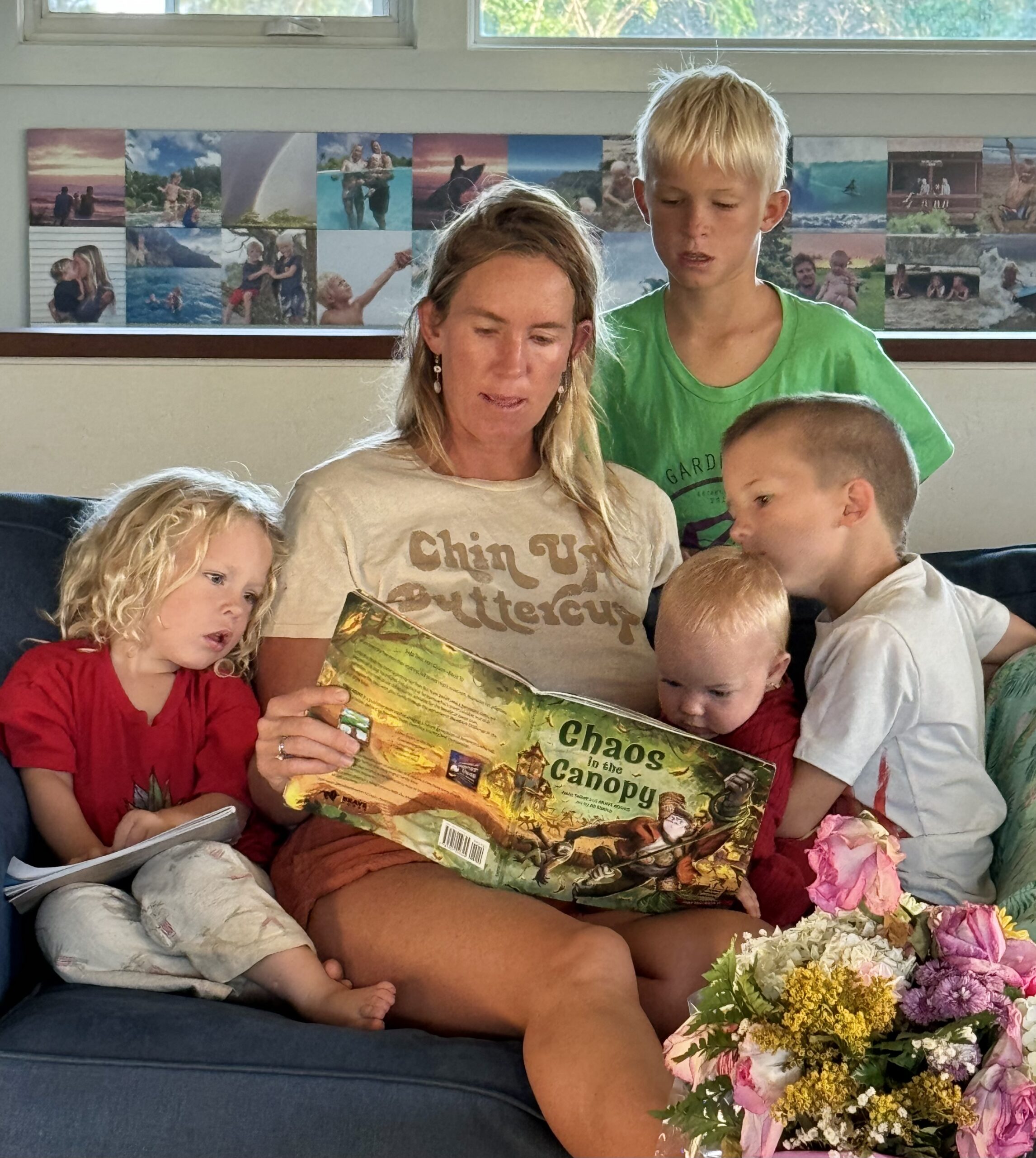 Bethany shares her family tips. One of them is reading with her kids. In this picture she reads a book to her 4 children.