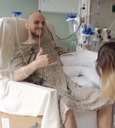 Josh recovers in the hospital and smiles for the camera